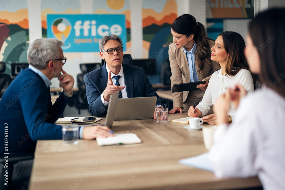 Team Collaboration During a Productive Business Meeting in a Modern Office Setting