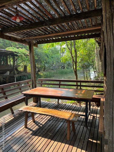 Rustic outdoor seating area surrounded by nature.