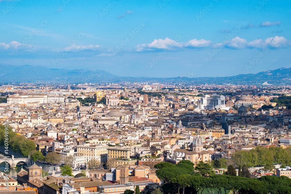 Obraz premium A cityscape view of the city of Rome, Italy as seen from the top of the Dome of St Peter's Basilica