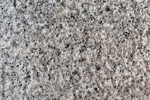 Granite natural textured background, close-up view
