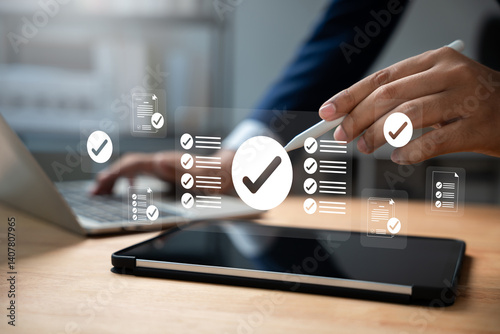 Online survey and checklist assessment, Digital questionnaire, Businessman use tablet to complete a digital form, making evaluation and selecting correct answers marked with check marks..