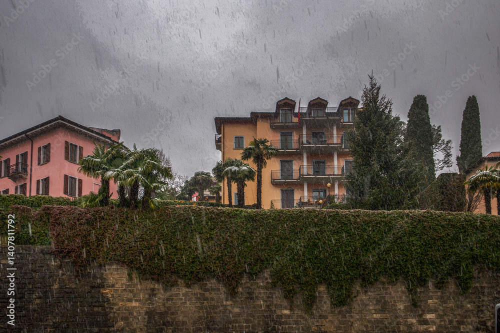 Snow on French riviera coastline - it quickly dissapearing on palms in Cannes or Nice or Marseille