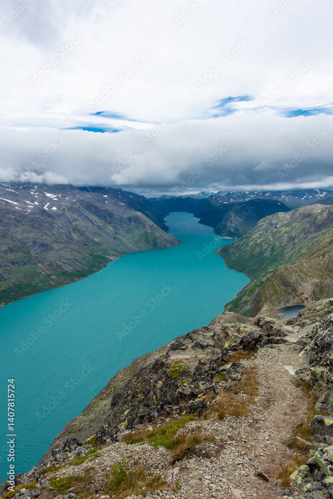 Amazing view of the Besseggen ridge, famous hiking spot in Jotunheimen National Park, admiring two glacial lakes with different colors