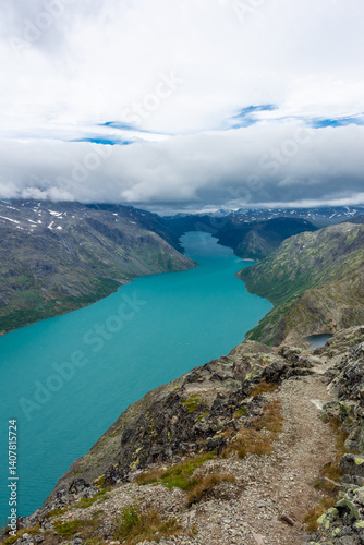 Obraz na płótnie Amazing view of the Besseggen ridge, famous hiking spot in Jotunheimen National Park, admiring two glacial lakes with different colors w salonie