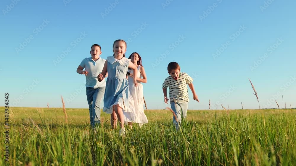 Happy kid running. Happy children running in park on green grass. Happy friends playing in park. Kid run, blue sky. Girl boy playing together. Group of children playing in park. Friends Girl boy run Happy kid running. Happy children running in park on green grass. Happy friends playing in park. Kid run, blue sky. Girl boy playing together. Group of children playing in park. Friends Girl boy run