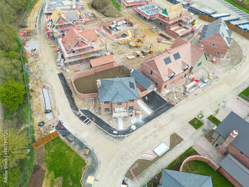 Obraz na płótnie Aerial view of partially completed private, detached executive homes in rural Essex, UK. Other homes comprise of affordable homes and earlier stages of completion. w salonie