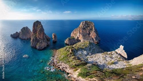 aerial view of tonnara di scopello and faraglioni rock formations sicily