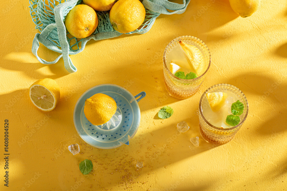 Homemade lemonade with crushed ice and sour fruit.