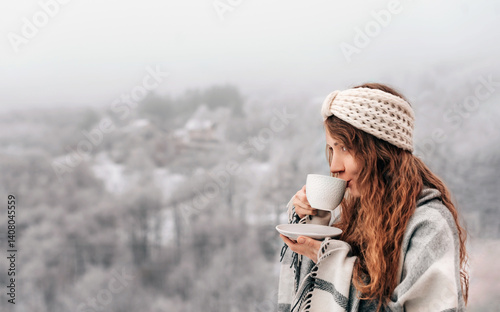 Woman Drinking Morning Coffee on Winter Terrace