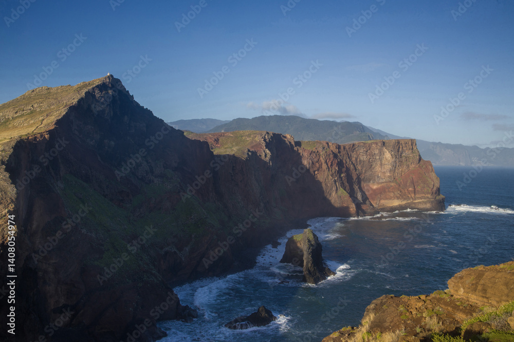 Explore the dramatic cliffs and rugged coastline of Madeira's Ponta de Sao Lourenco during a clear sunny day