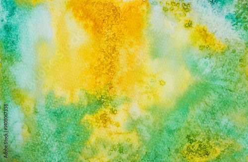 Vibrant watercolor abstract showcasing green and yellow hues blending together in a soft and organic pattern