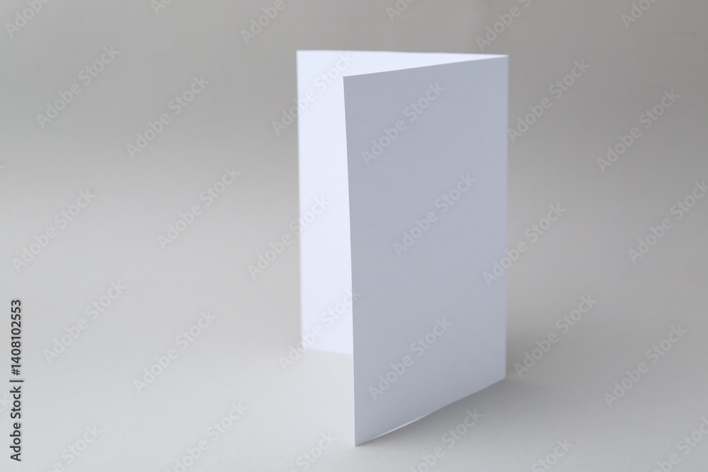 One blank greeting card on light background One blank greeting card on light background