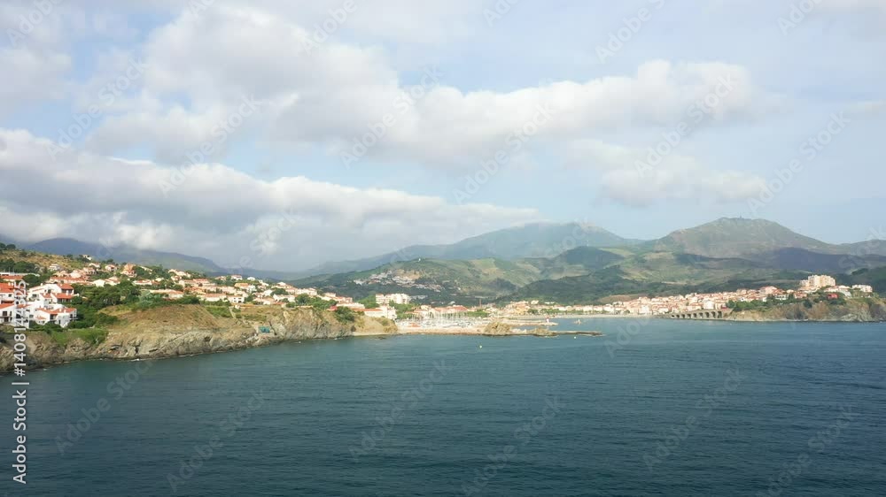 The medieval municipality located on the coast in Europe, in France, in Occitanie, in the Pyrenees Orientales, in Banyuls-sur-Mer, on the edge of the Mediterranean Sea, in summer, on a sunny day. The medieval municipality located on the coast in Europe, in France, in Occitanie, in the Pyrenees Orientales, in Banyuls-sur-Mer, on the edge of the Mediterranean Sea, in summer, on a sunny day.