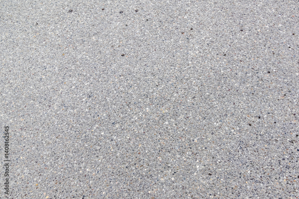 Close-up of textured asphalt road surface..