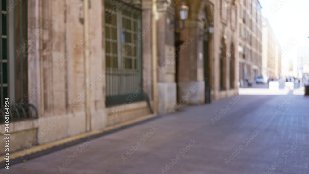 Blurred image of an outdoor street scene in marseilles, france with a bokeh effect, showcasing defocused architecture and european urban charm. Blurred image of an outdoor street scene in marseilles, france with a bokeh effect, showcasing defocused architecture and european urban charm.