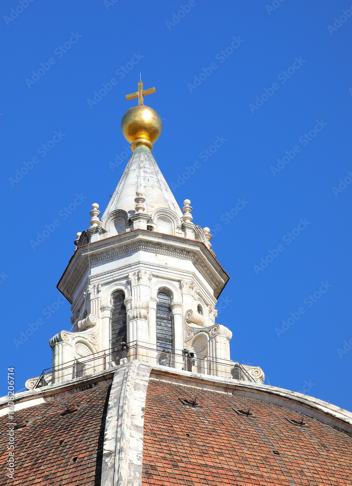 Detail of big Golden sphere on top fo Dome Of Brunelleschi in Florence - Italy Detail of big Golden sphere on top fo Dome Of Brunelleschi in Florence - Italy