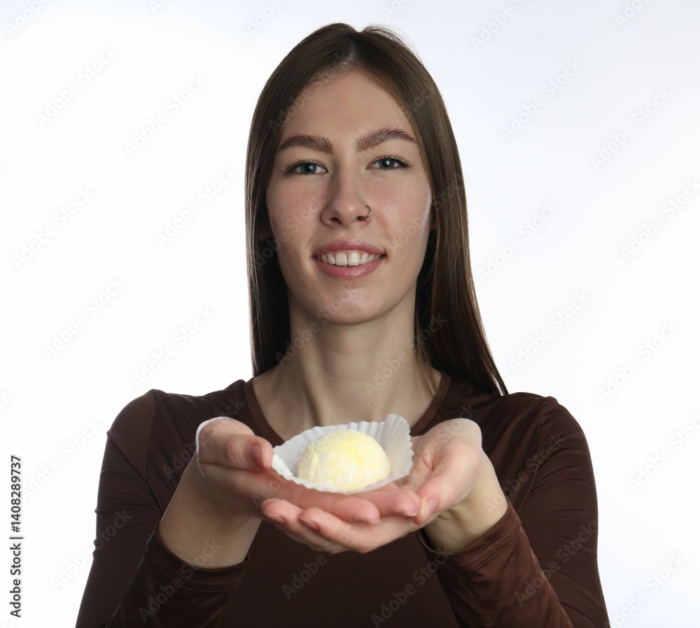Smiling woman with tasty mochi on white background Smiling woman with tasty mochi on white background
