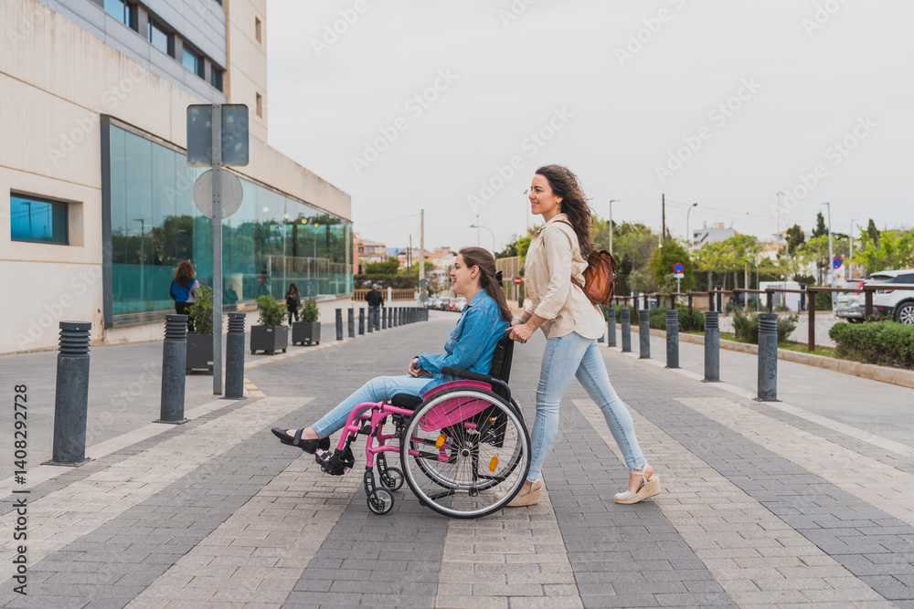 Obraz premium Young woman with cerebral palsy pushed by assistant near medical center - They move confidently along accessible path outside - Concept of cerebral palsy