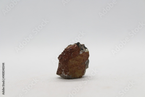 Pyrite in a rock isolated on a white background. natural silver pyrite gem on white background. Pyrrhotite or Pyrite from Baska, Frydek Mistek, Czech republic  photo