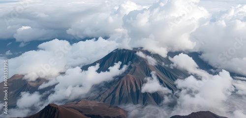 Misty Andean volcanic peaks shrouded in swirling clouds and fog, mountain, beautiful, texture