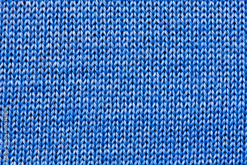 Blue knitted wool fabric background (texture). Flat lay, top view
