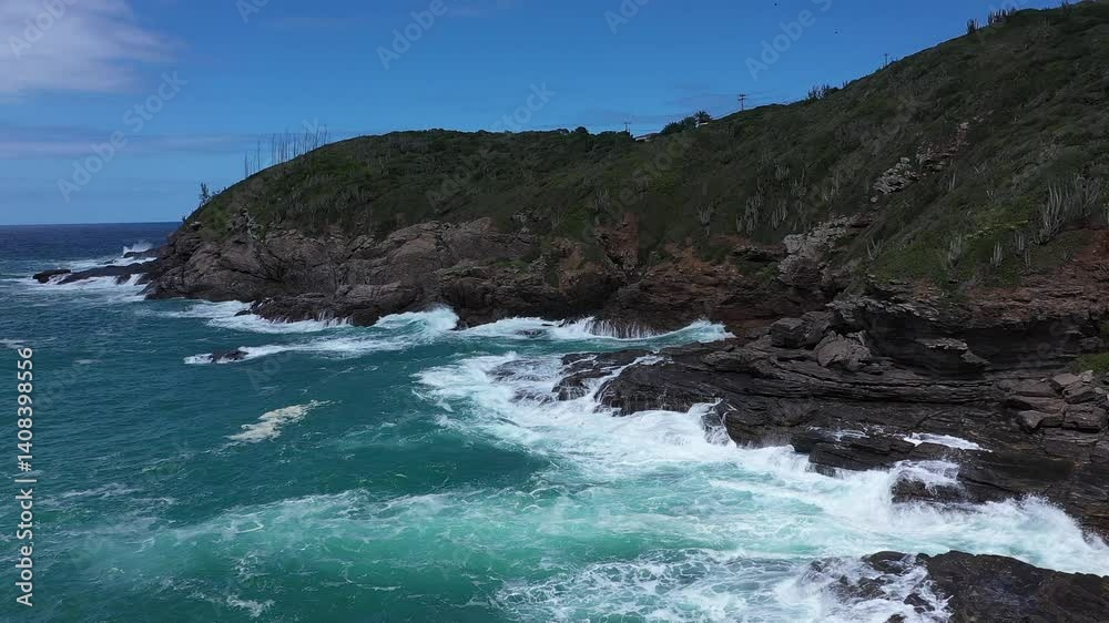 Aerial view of Búzios' stunning coastline, a vibrant tourist destination known for its beach lifestyle in the Lake District Aerial view of Búzios' stunning coastline, a vibrant tourist destination known for its beach lifestyle in the Lake District
