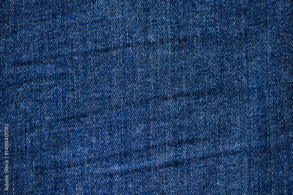 Naklejka premium Navy blue denim jeans background (texture)
