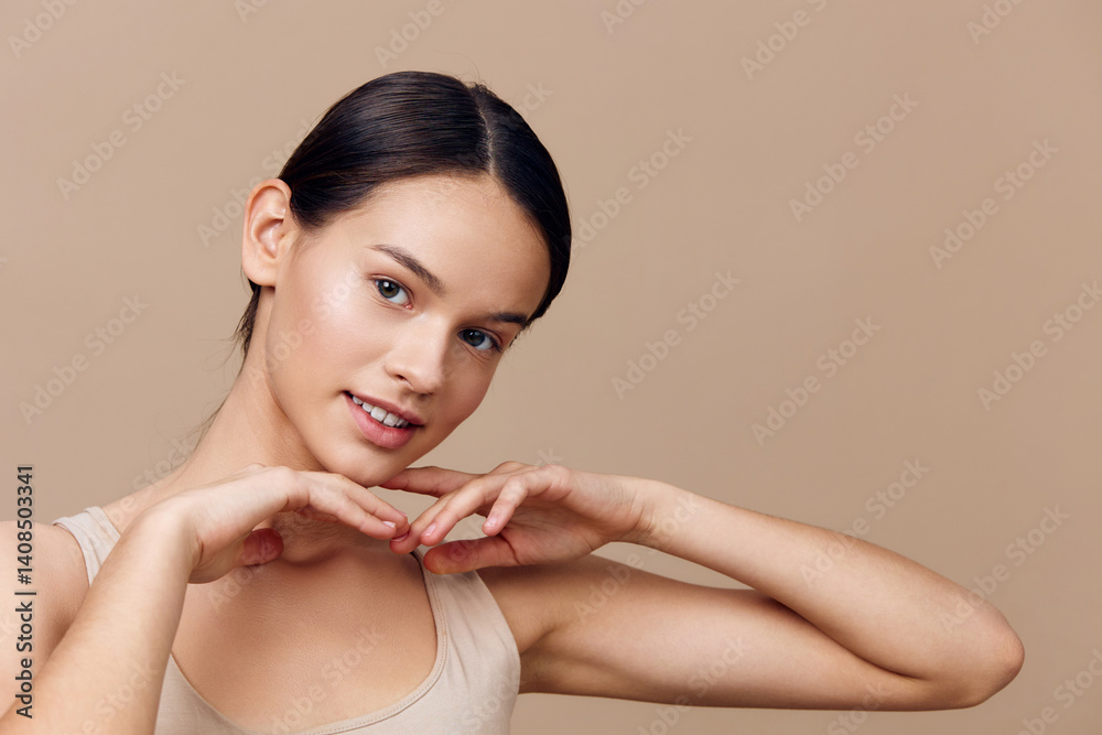 Smiling young model with a neutral background showcasing beauty and confidence, perfect for wellness, skincare, and fashion concepts
