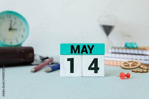 14 fourteenth day May Month Calendar Concept on Wooden Blocks