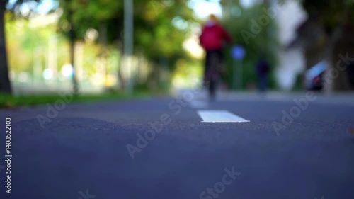 Bicyclist child navigating a bike lane in the city. Symbol of healthy lifestyle, sustainable transportation, and child-friendly urban planning.