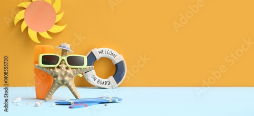 Obraz na płótnie Starfish with sunglasses, bottle of sunscreen cream and mini surfboards on color background with space for text w salonie
