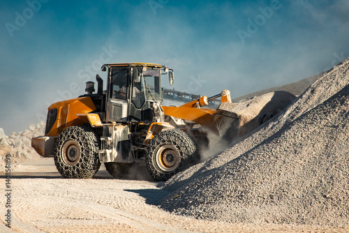 Big bulldozer at marble mining quarry