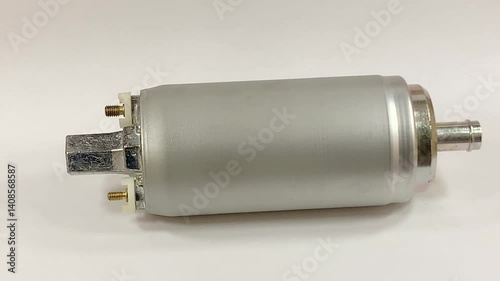 Automotive electric fuel pump for fuel injected vehicles