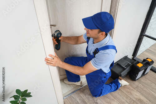 Male worker with electric d...