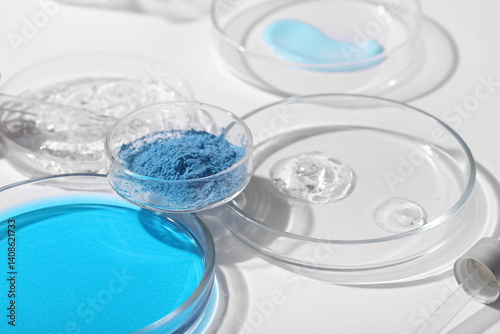 Petri dishes with different samples on white background