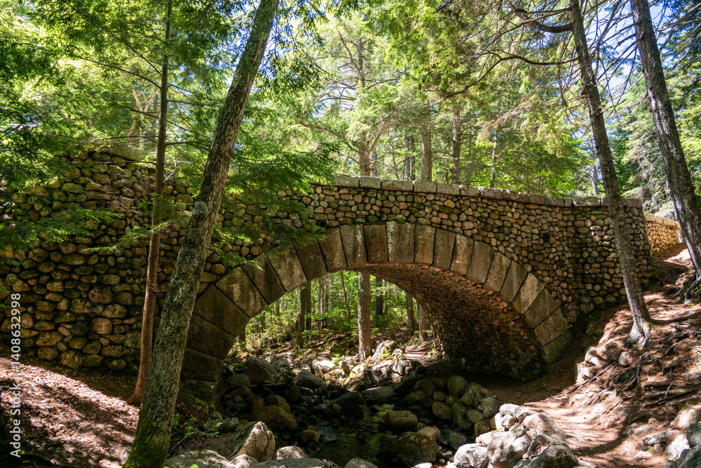 Rocky Trail Passes Under The Cobblestone Bridge In Acadia