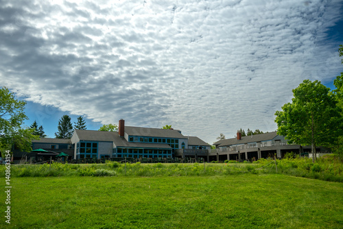 Obraz na płótnie Sheet Of Clouds Pass Over Jordan Pond House In Acadia w salonie