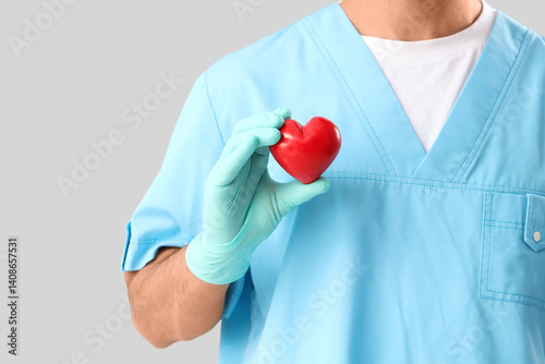 Male doctor with heart on l...