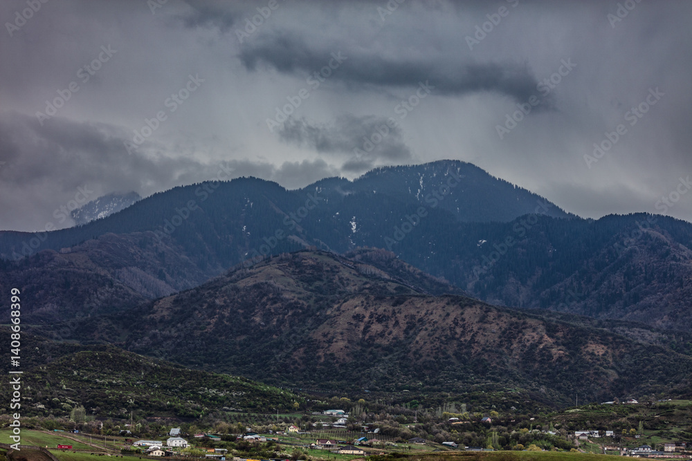 Naklejka premium mountain landscape with clouds