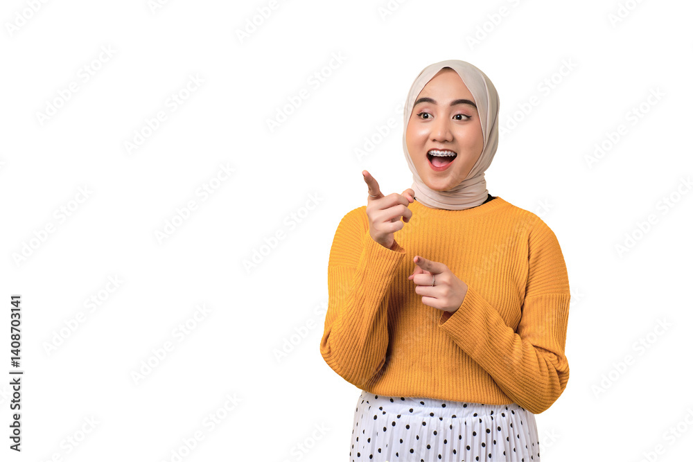 Beautiful shocked Asian girl wearing hijab pointing finger at empty copy space isolated on transparent background Beautiful shocked Asian girl wearing hijab pointing finger at empty copy space isolated on transparent background