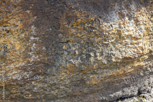 Macro abstract texture background of the grinding surface on a 19th century grist mill stone