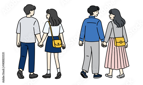 手をつなぐ私服カップルの後ろ姿