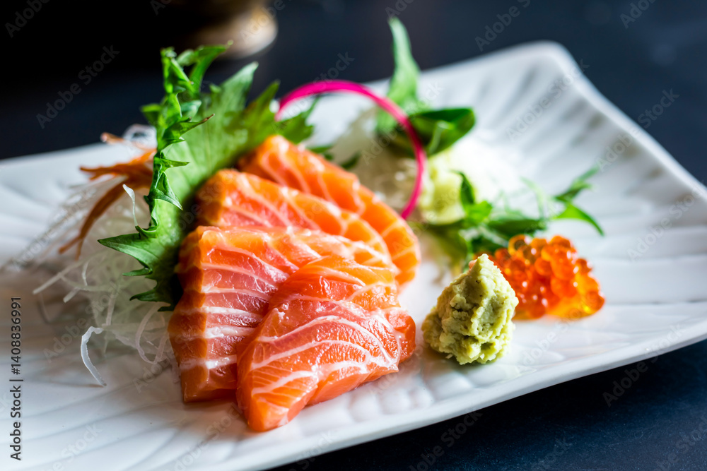 Delicious Salmon Sashimi With Ikura And Wasabi On A White Plate Delicious Salmon Sashimi With Ikura And Wasabi On A White Plate