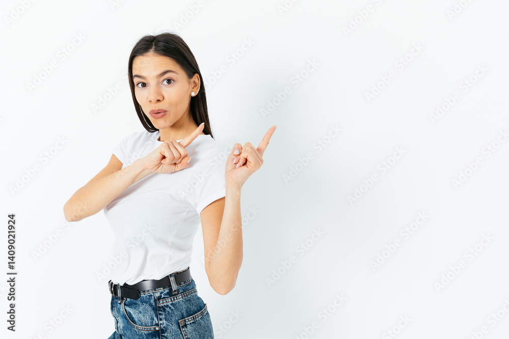 A woman is pointing to the sky with her finger A woman is pointing to the sky with her finger