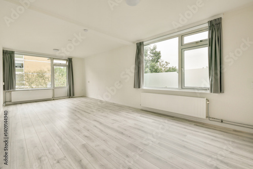 A light-filled minimalist interior featuring large windows  clean lines  and a serene atmosphere inviting tranquility and creativity.