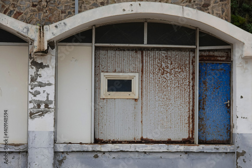 old abandoned warehouse with closed doors