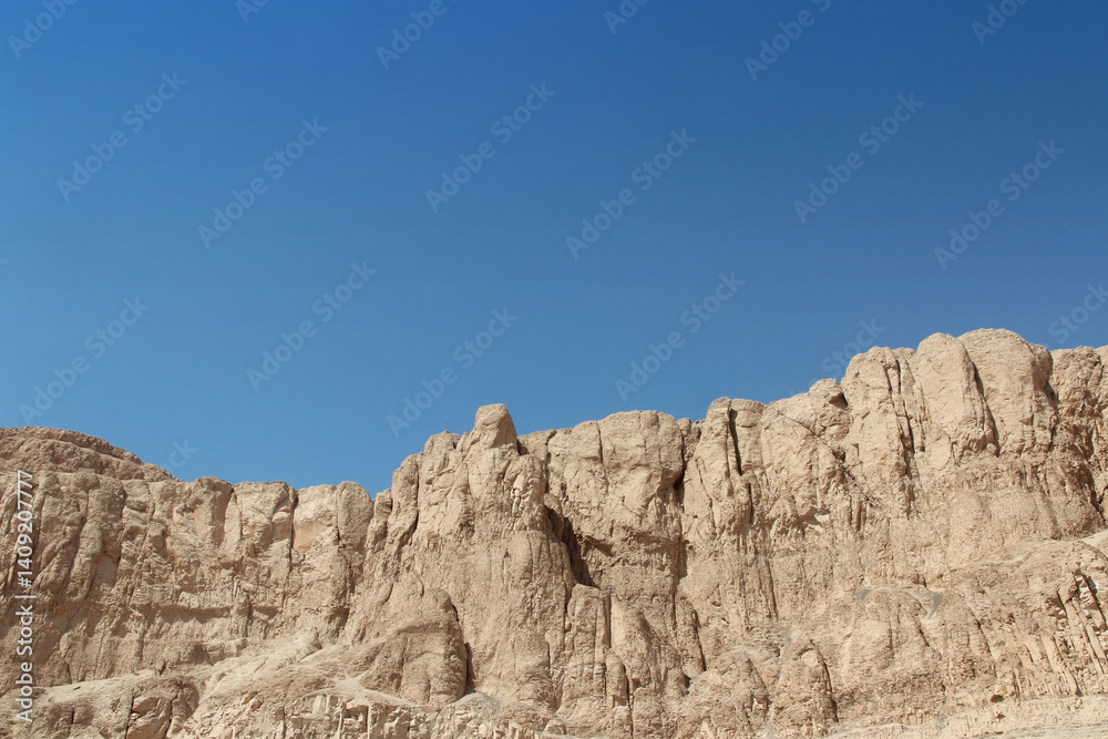 Limestone mountain for the construction of the Temple of Hatshepsut in Luxor, Egypt Limestone mountain for the construction of the Temple of Hatshepsut in Luxor, Egypt