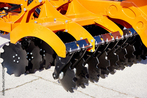 Trailed in-line disc harrow at agricultural exhibition