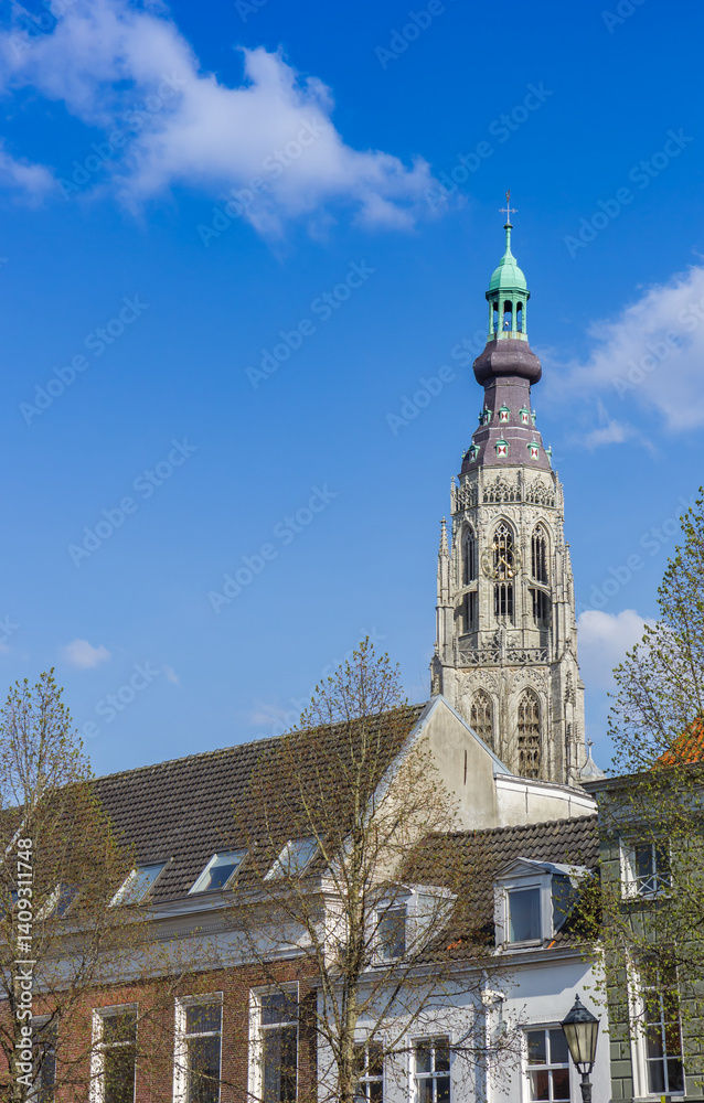 Houses in front of the historic church tower in Breda, Netherlands