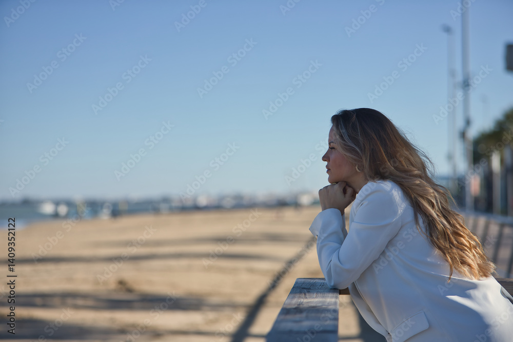 Young, beautiful woman, brown hair, white jacket, hands on her chin, leaning on a wooden railing looking at infinity. Young, beautiful woman, brown hair, white jacket, hands on her chin, leaning on a wooden railing looking at infinity.